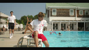 Lifeguard Watching Over Pool Wallpaper