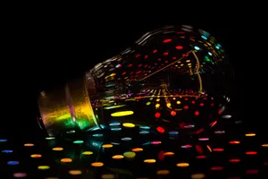 Light Bulb With Colorful Lights Wallpaper