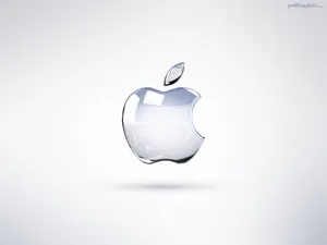 Light Glinting Off The Iconic Apple Logo On The Iphone X Wallpaper