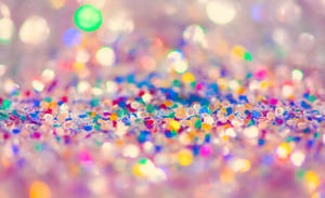 Light Up Your World With The Dazzling Hues Of A Sparkly Night. Wallpaper