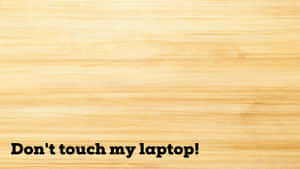 Light Wooden Surface Don't Touch My Laptop Wallpaper