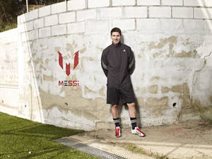 Lionel Messi With Messi Logo Wallpaper