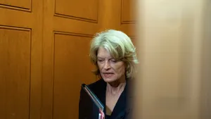Lisa Murkowski Analyzing Important Documents Wallpaper