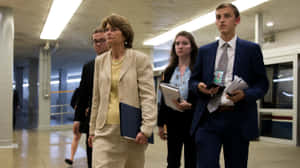 Lisa Murkowski Walking With Staff Wallpaper