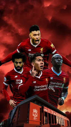 Liverpool Fc Trio Firmino, Salah And Mane, Alongside Team Mate Chamberlain, Celebrating A Winning Goal Wallpaper