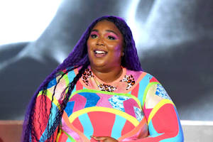 Lizzo Long Purple Hair Wallpaper