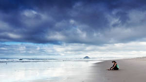 Lonely Girl On Beach Sand Wallpaper