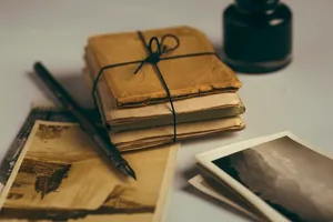 Look Back And Reminisce With Vintage Letters And Photos. Wallpaper