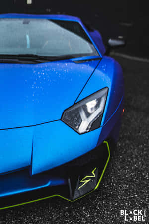 Looking Sharp In A Blue Lamborghini. Wallpaper