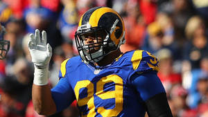 Los Angeles Rams Aaron Donald Blue Jersey Wallpaper