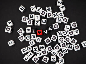 Love Inscription On Dices Wallpaper