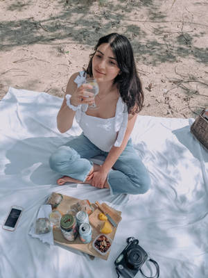 Lovely Girl Having A Picnic Wallpaper