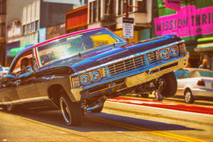 Lowrider Impala Bouncing Diagonally Wallpaper