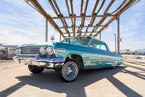 Lowrider Impala Under Wooden Roof Wallpaper