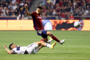 Lucas Cavallini Lying On Field Wallpaper