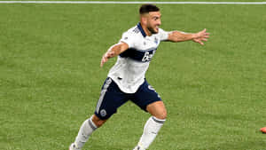 Lucas Cavallini Soccer Player Celebration Wallpaper