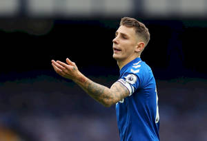 Lucas Digne In Action On Soccer Field Wallpaper