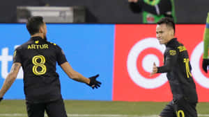 Lucas Zelarayan With Teammate Jose Artur Wallpaper