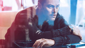 Luke Evans Window Reflection Wallpaper