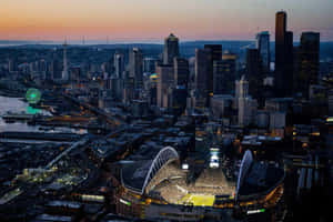 Lumen Field In Seattle At Night Wallpaper