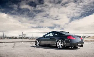 Luxurious 2004 Infiniti G35 Coupe In Action Wallpaper