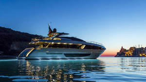 Luxurious Private Yacht Sailing The High Seas Wallpaper