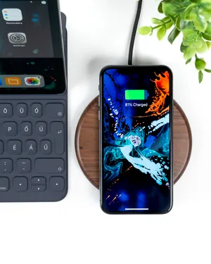 Luxury Golden Iphone Xs On A Marble Surface Wallpaper