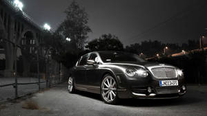 Luxury In Motion - The Bentley Grand Convertible Wallpaper