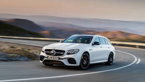 Luxury In Motion - White Mercedes-benz E63 Amg Wallpaper