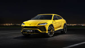 Luxury Supercar - Lamborghini Urus At Night Wallpaper