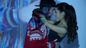 Mac Miller And Ariana Grande In Romantic Pose Wallpaper