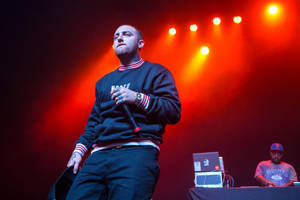 Mac Miller Performing At Concert Wallpaper