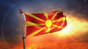 Macedonia Flag Against Bright Sun Wallpaper