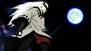 Madara Stares At A Bright Full Moon In The Night Sky Wallpaper