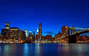 Magnificent New York City Skyline At Sunset Wallpaper