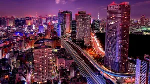 Magnificent View Of Tokyo Skyline From Seaside Top Observatory Wallpaper