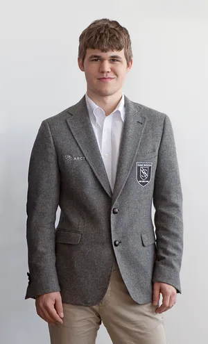 Magnus Carlsen In Cashmere Overcoat Wallpaper