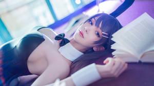 Mai Sakurajima Cosplayer With Book Wallpaper