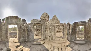 Majestic Angkor Thom Shrouded Beneath A Mysterious Gray Sky Wallpaper