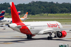 Majestic Avianca Airline Airbus In Mid-flight Wallpaper