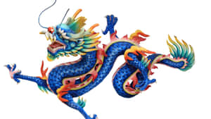 Majestic Blue Dragon Soaring Through The Skies Wallpaper