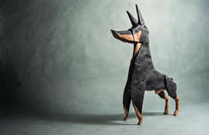 Majestic Doberman Looking Off Into The Horizon Wallpaper