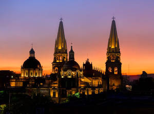Majestic Guadalajara Cathedral Under A Radiant Sky Wallpaper
