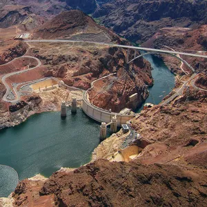 Majestic Hoover Dam Nestled In A Rocky Landscape Wallpaper