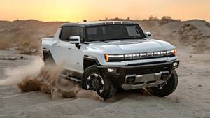 Majestic Hummer Dominating The Sands Wallpaper