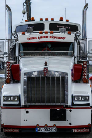 Majestic Kenworth Tank-liner Express On The Move Wallpaper