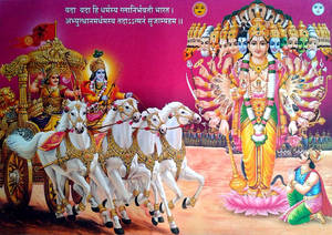 Majestic Moment Of Krishna-arjuna On The Golden Chariot Wallpaper