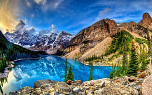 Majestic Moraine Lake In The Heart Of The Rocky Mountains Wallpaper