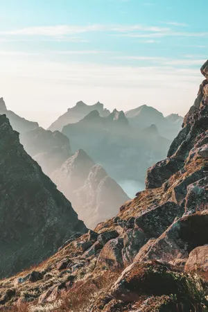 Majestic Mountain Range Rising Into The Sky Wallpaper