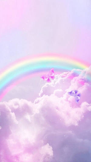 Majestic Rainbow Amidst The Clouds Wallpaper